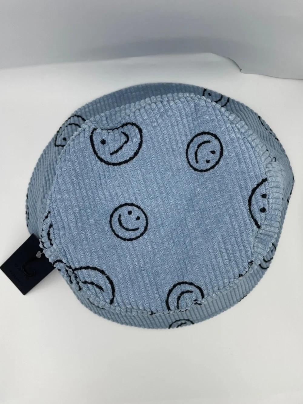 David and Young blue corduroy smiley faces buckle hat